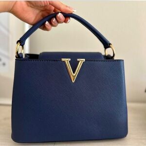 12x10” navy mid size bag - brand new condition